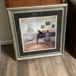 Framed Print of Small Girl Playing a Piano