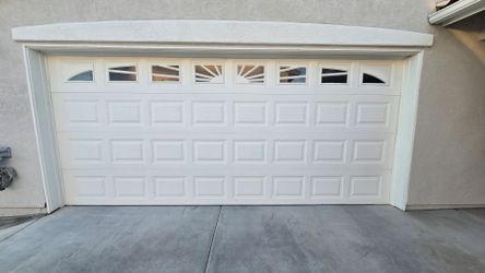 16' x 7' and 8' x 7 garage doors with openers, remotes and hardware