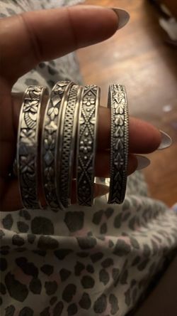 5  bracelets sliver . Size 7.5