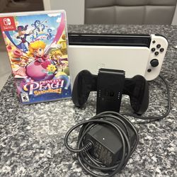 Nintendo Switch Oled + 2 games