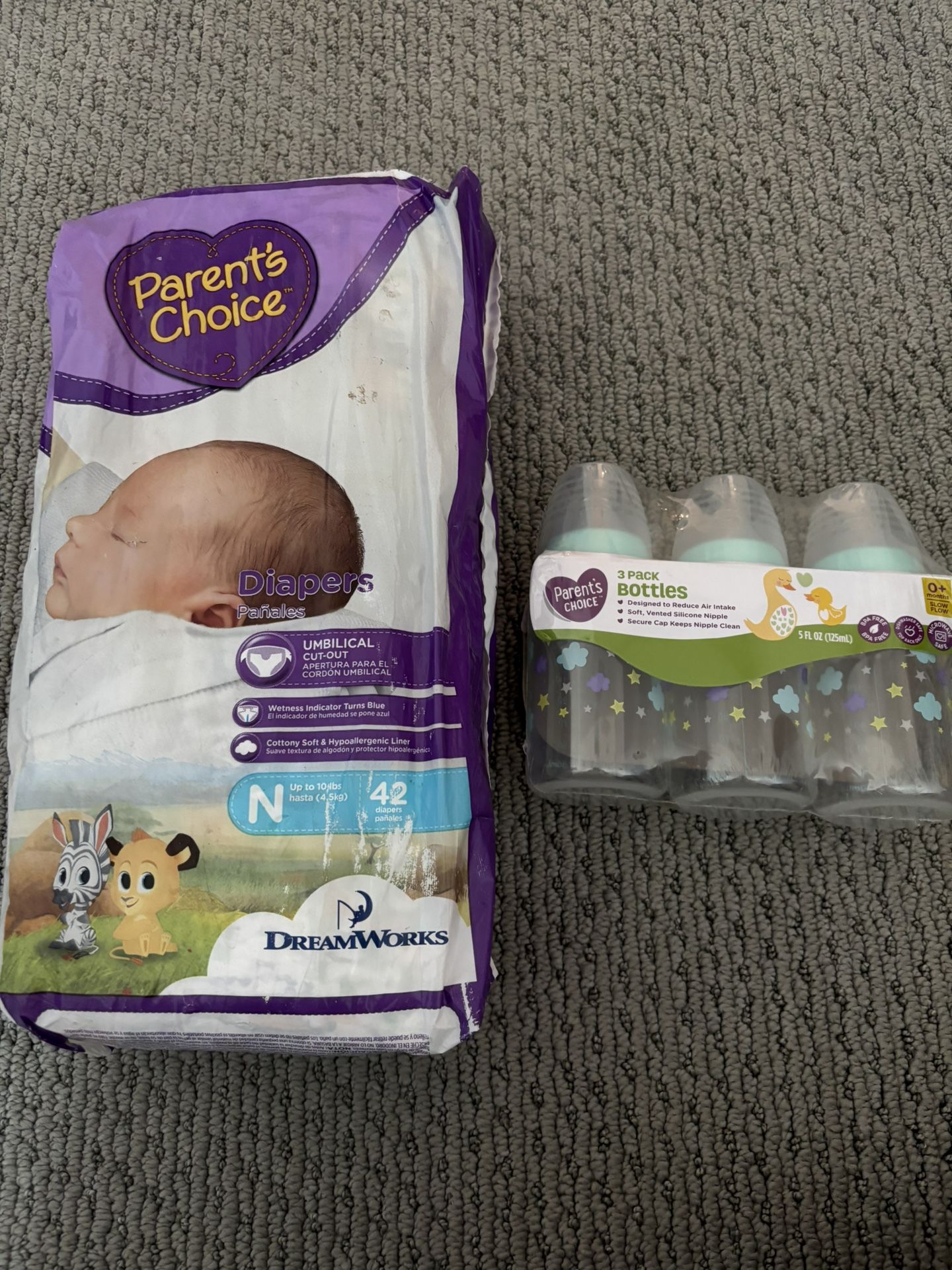 Newborn Diapers And Baby Bottles