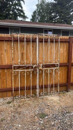 White iron gates 74” height and 56” width