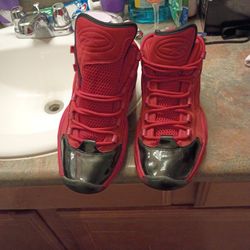 Red and Black Leather Reekboks 