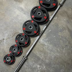 Rubber Coated Olympic Weights With 7 Foot Barbell