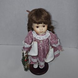 Geppeddo Porcelain & Cloth Collectible Doll Dark Hair & Pink Dress With Skates