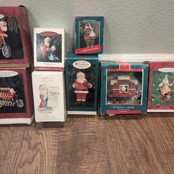 Lot Of 8 vintage Hallmark Ordiments all Of Different Santas