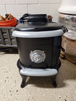 ANTIQUE POT BELLY STOVE