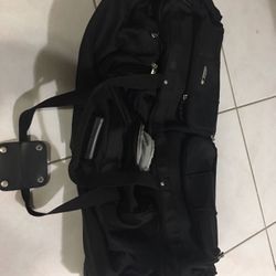 Large Delsey Rolling Duffle -travel suitcase