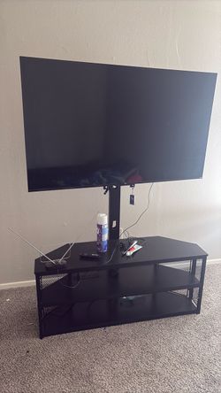 TCL and tv stand