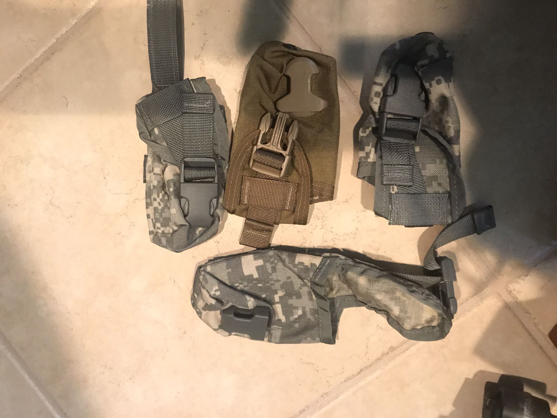 Military type small bags with adjustable belt. $8/ Each