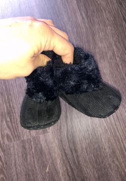 Baby girl boots . Never used . Size 2 maybe . Smoke and pet free home