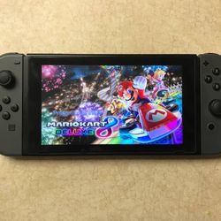 NINTENDO SWITCH V2 LOADED with 100 SWITCH GAMES + 7500 RETRO GAMES