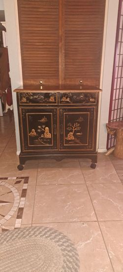 Chinoiserie cabinet 2 drawers and 2door cupboard.