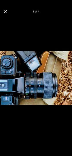 Minolta X-9 Film Camera w/ Zoom Lens and Flash & Carrier Bag