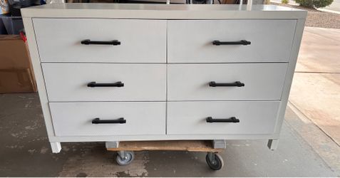 White dresser with black drawer pulls