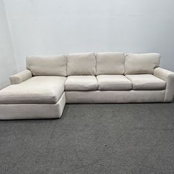 This 2 pc Sectional Beige Couch amazing condition, comfy couch. We deliver & setup.