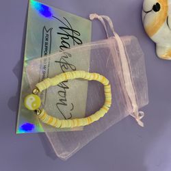 yin and yang charm, yellow clay beaded bracelet