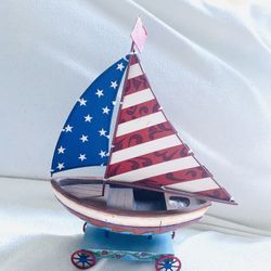 Jim Shore “Keep Freedom Afloat” Sailboat On Wheels