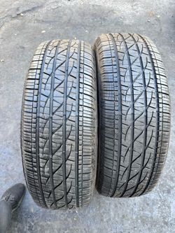 Set of 2 nice Firestone destination LE3  235/65/17 ( We install & balance)