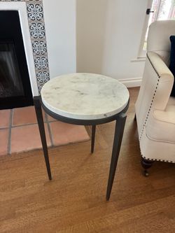 Marble top side table, 17” x 24.5”.