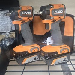 NEW RIDGID 18V BRUSHLESS 1/2" AND 3/8" IMPACT WRENCHS WITH 2-4AH BATTERIES AND CHARGER 220 