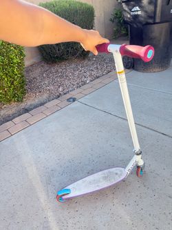 Whit and pink kids scooter