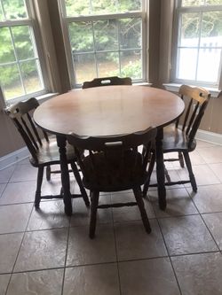 Table and chairs and leaf