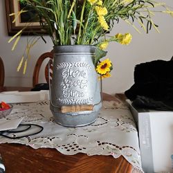 Gray Metal Vase With Yellow Flowers