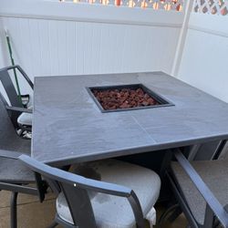 Fire pit table with propane tank