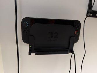 Perfect condition Switch 2, comes with 256gb Samsung MicroSD Express Card, mount and game