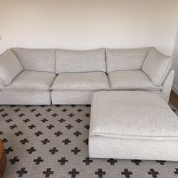 Three Piece Sectional Sofa With Rolling Ottoman