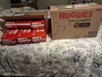 2 boxes diapers. 12 bags