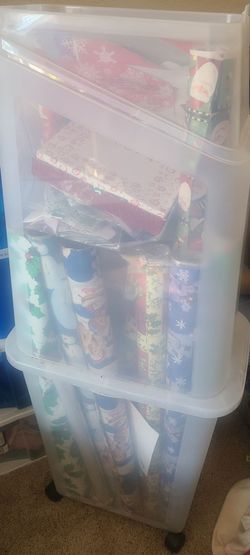Wrapping paper storage on wheels