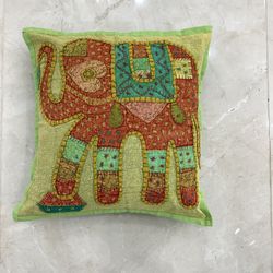 Handmade embroidery Indian pillowcase with matching mini vases for accent room makeover