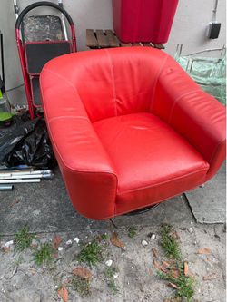modern swivel barrel/lounge chair in red faux leather