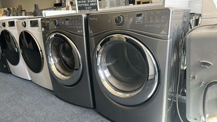 Front load Whirlpool washer and dryer set