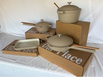 4-piece Our Place cookware collection with all original lids, utensils, and steamer basket included.