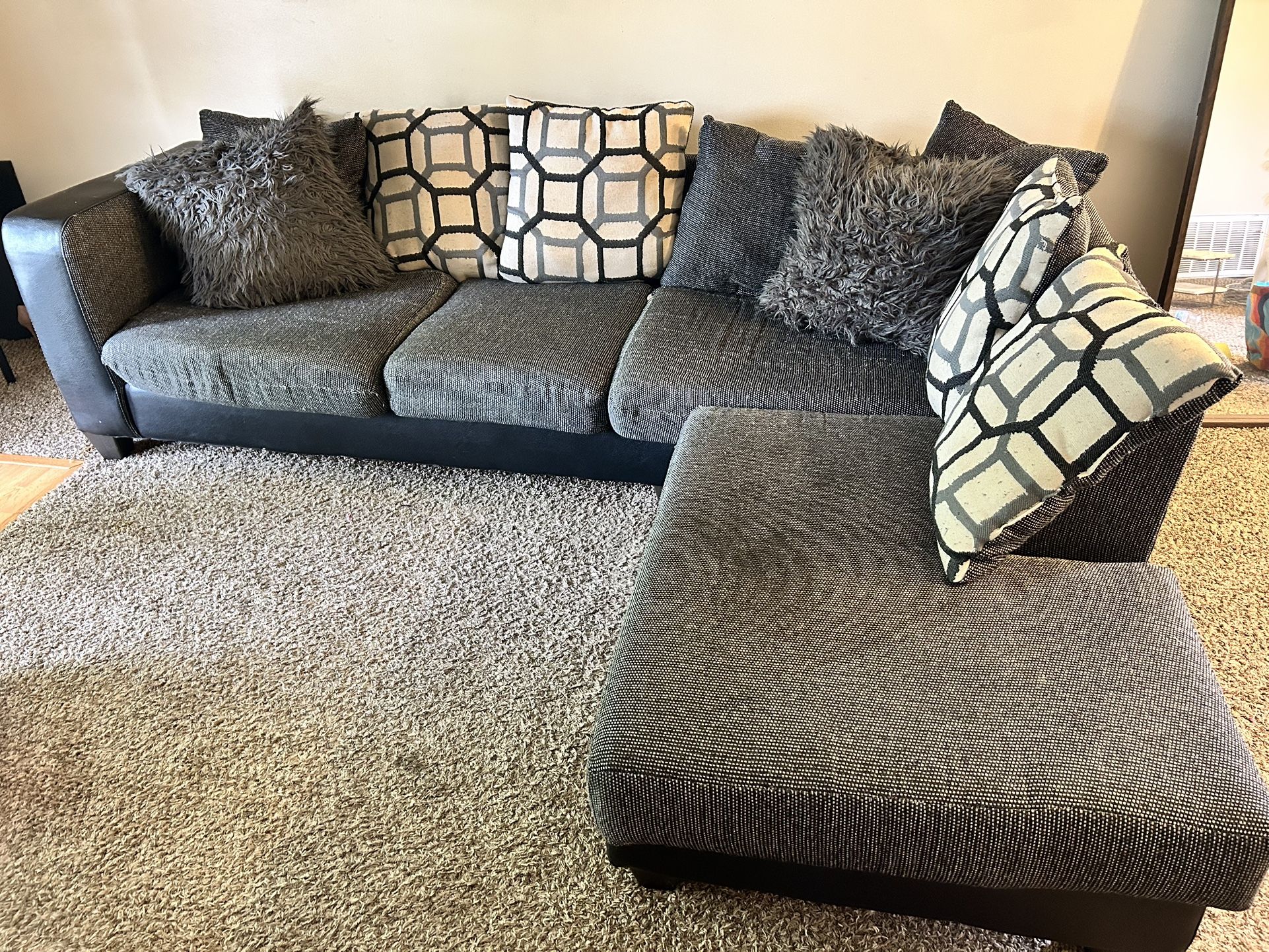 Comfy and stylish Black and tan Sectional