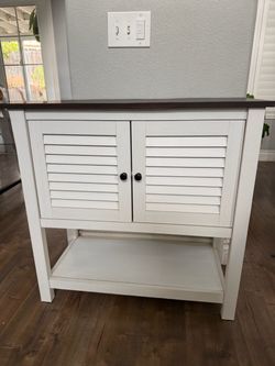 White farmhouse accent storage cabinet