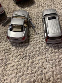 Two toy cars like real