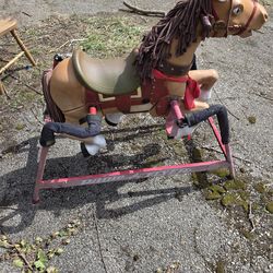 Kids bouncing horse