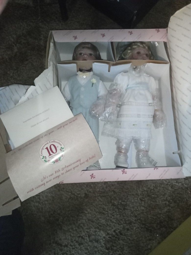 Brand New 10th Anniversary Porcelain Dolls