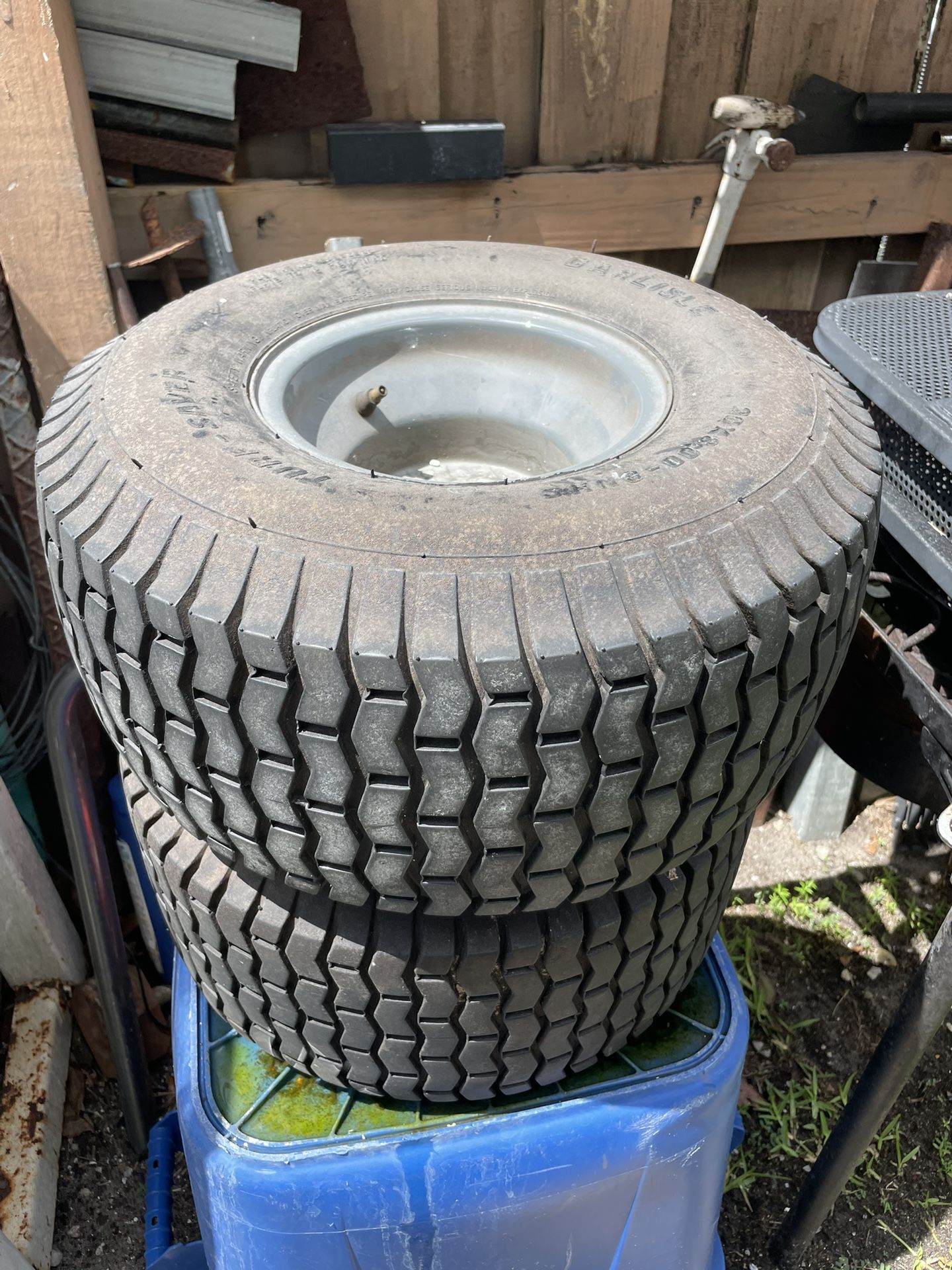 2 lawnmower, wheels good shape hold air $20 for both
