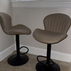 Gray and black adjustable bar stools