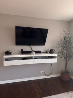 White Floating tv center with LED lights