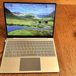 Microsoft Surface Go Touch Screen Laptop, 12.4” Charger And Wireless Mouse Included