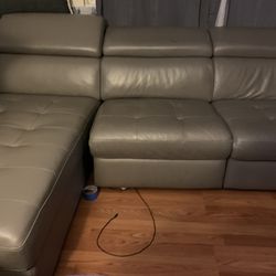 L shaped  grey leather recliner