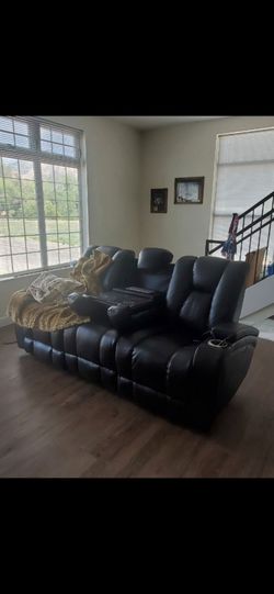 Black leather couch/ theater couch