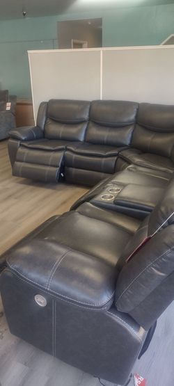New power sectional sofa with three power recliners on sale now don't miss