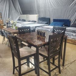 Beautiful faux marble high top dining set with 4 chairs 